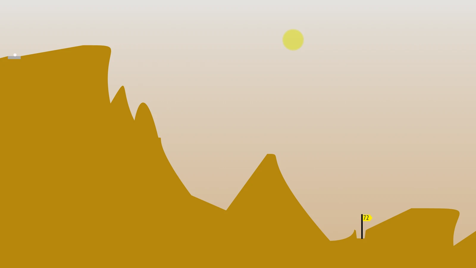 Sun Golf hole 72 with the flag on the desert plateau beneath the afternoon sun